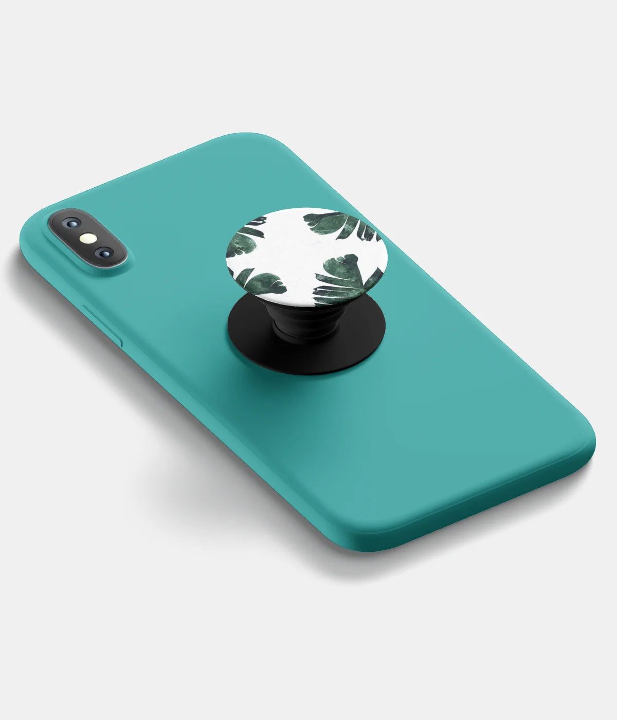 A top-down view of a phone grip holder attached to a mobile phone case on a white background