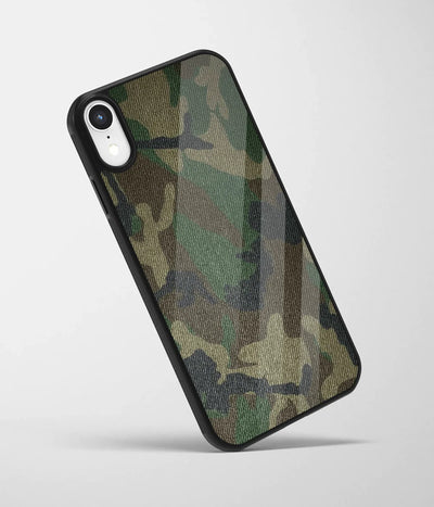 An angled view of a glass phone case featuring a vibrant design.