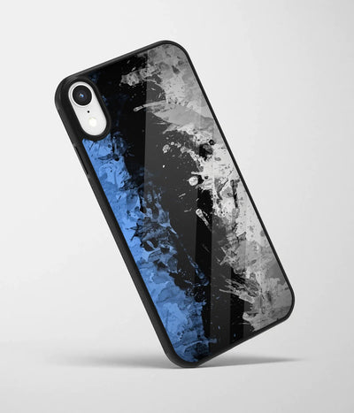 An angled view of a glass phone case featuring a vibrant design.