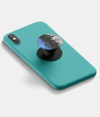 A top-down view of a phone grip holder attached to a mobile phone case on a white background