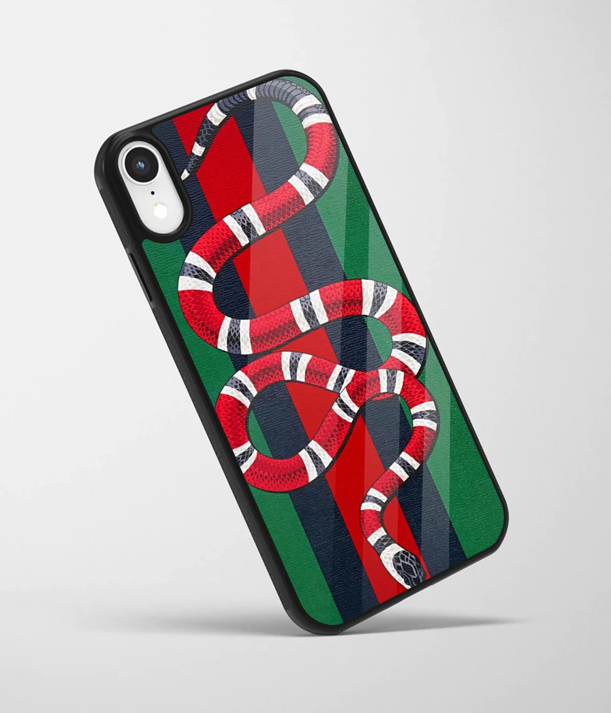An angled view of a glass phone case featuring a vibrant design.