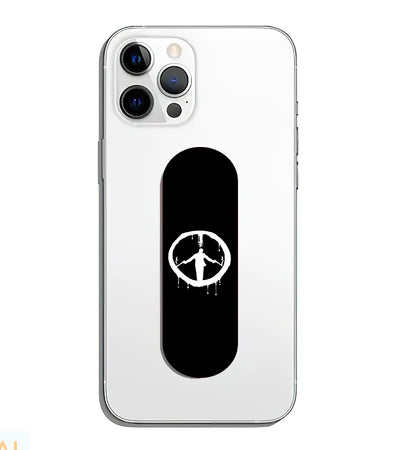 A phone grip slider applied to the back of a smartphone.