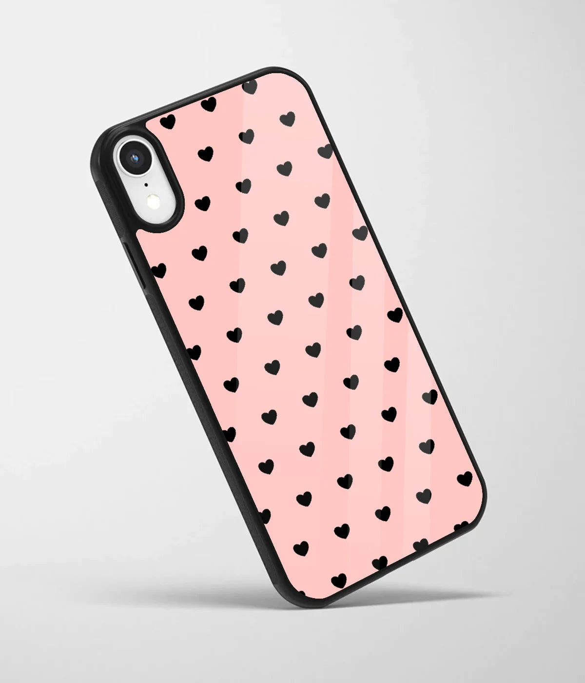 An angled view of a glass phone case featuring a vibrant design.