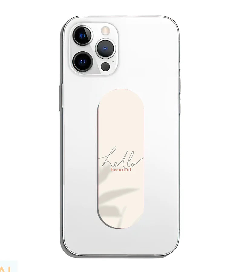 A phone grip slider applied to the back of a smartphone.