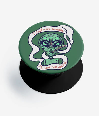 A top-down view of a phone grip holder on a clean white background