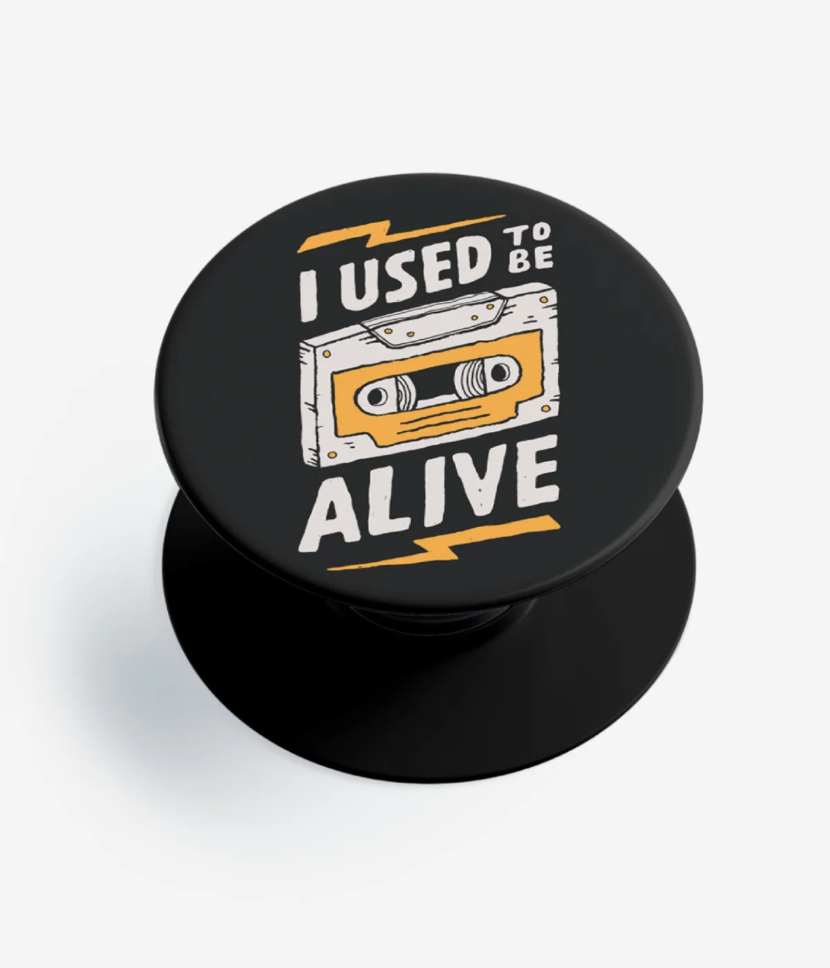 A top-down view of a phone grip holder on a clean white background