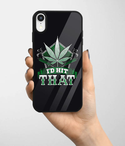 A hand holding a glass phone case with a colorful design.