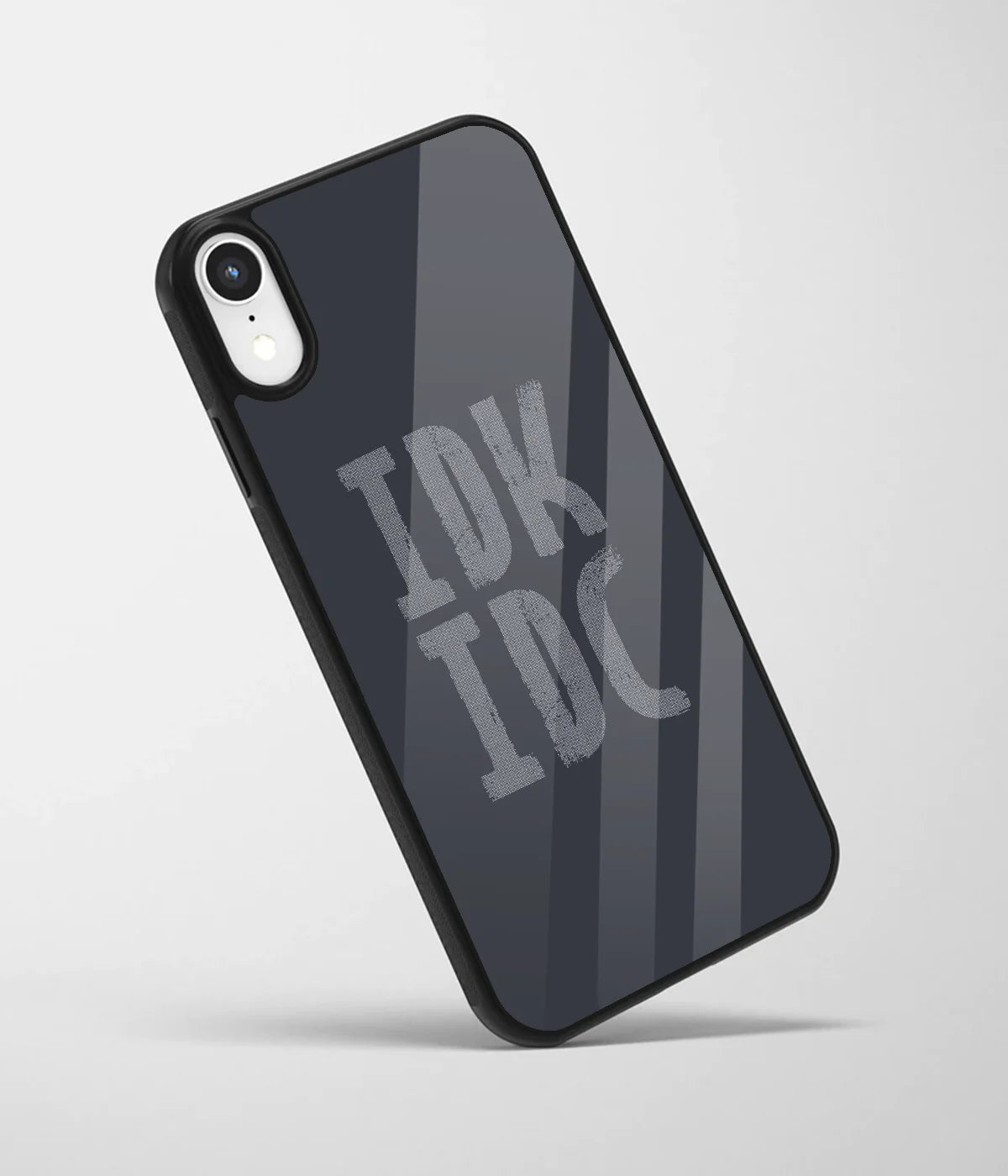 An angled view of a glass phone case featuring a vibrant design.