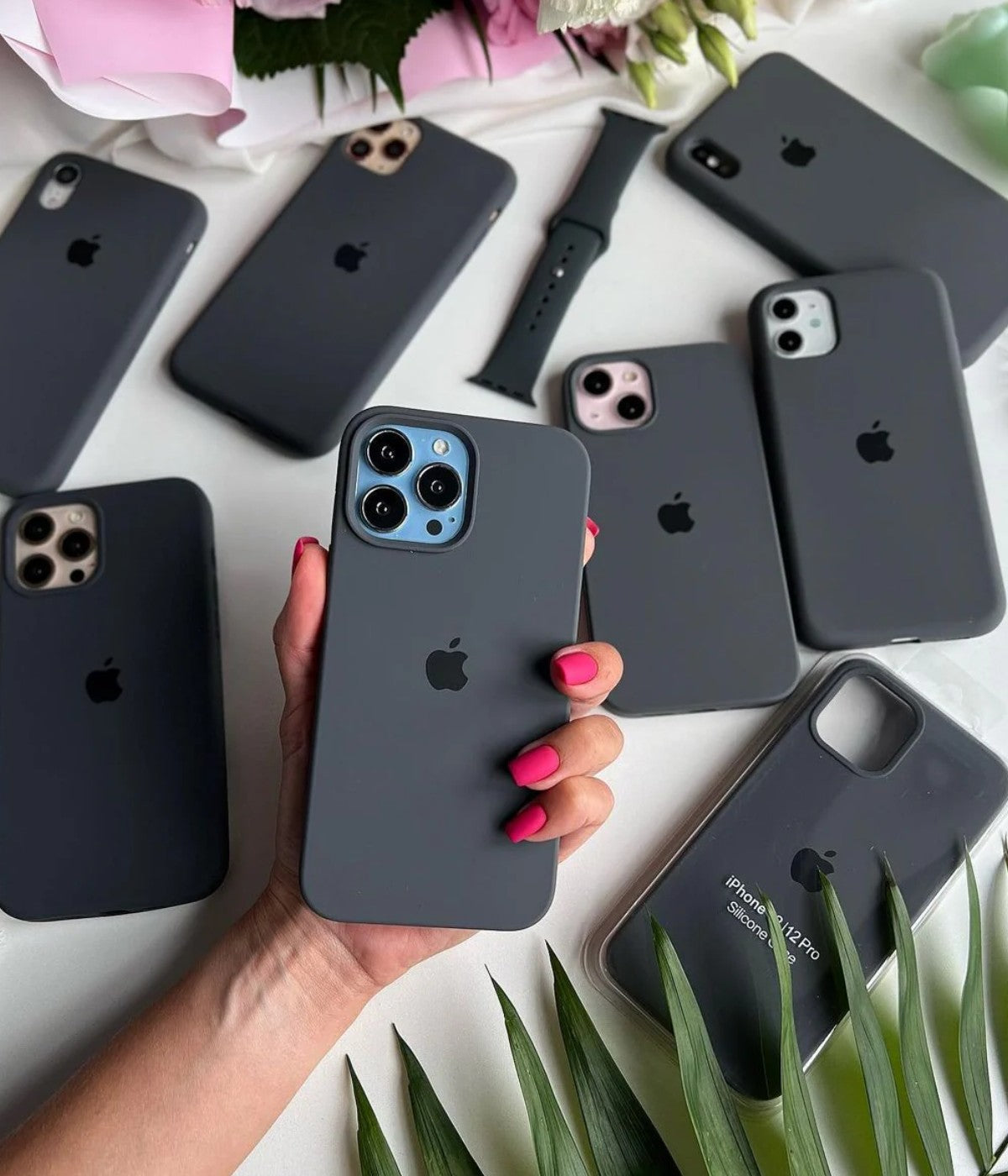 A dark grey liquid silicone case for the iPhone.