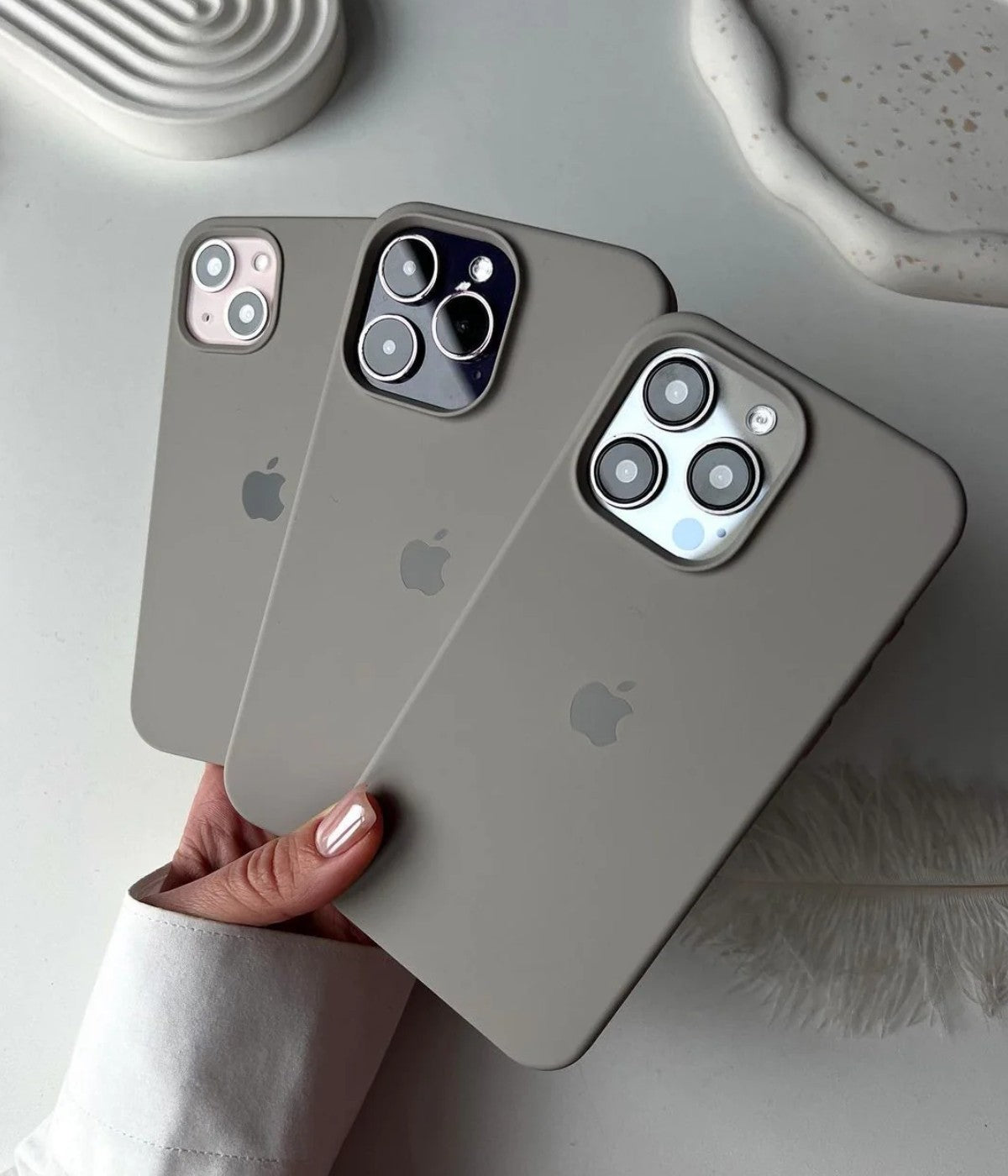 A graphite grey liquid silicone case for the iPhone.