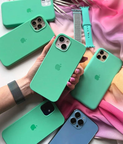 A mint green liquid silicone case for the iPhone.