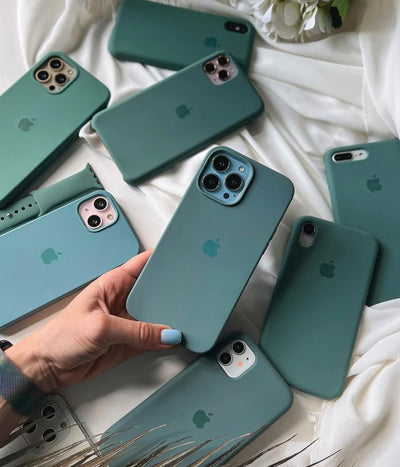 A pine green liquid silicone case for the iPhone.