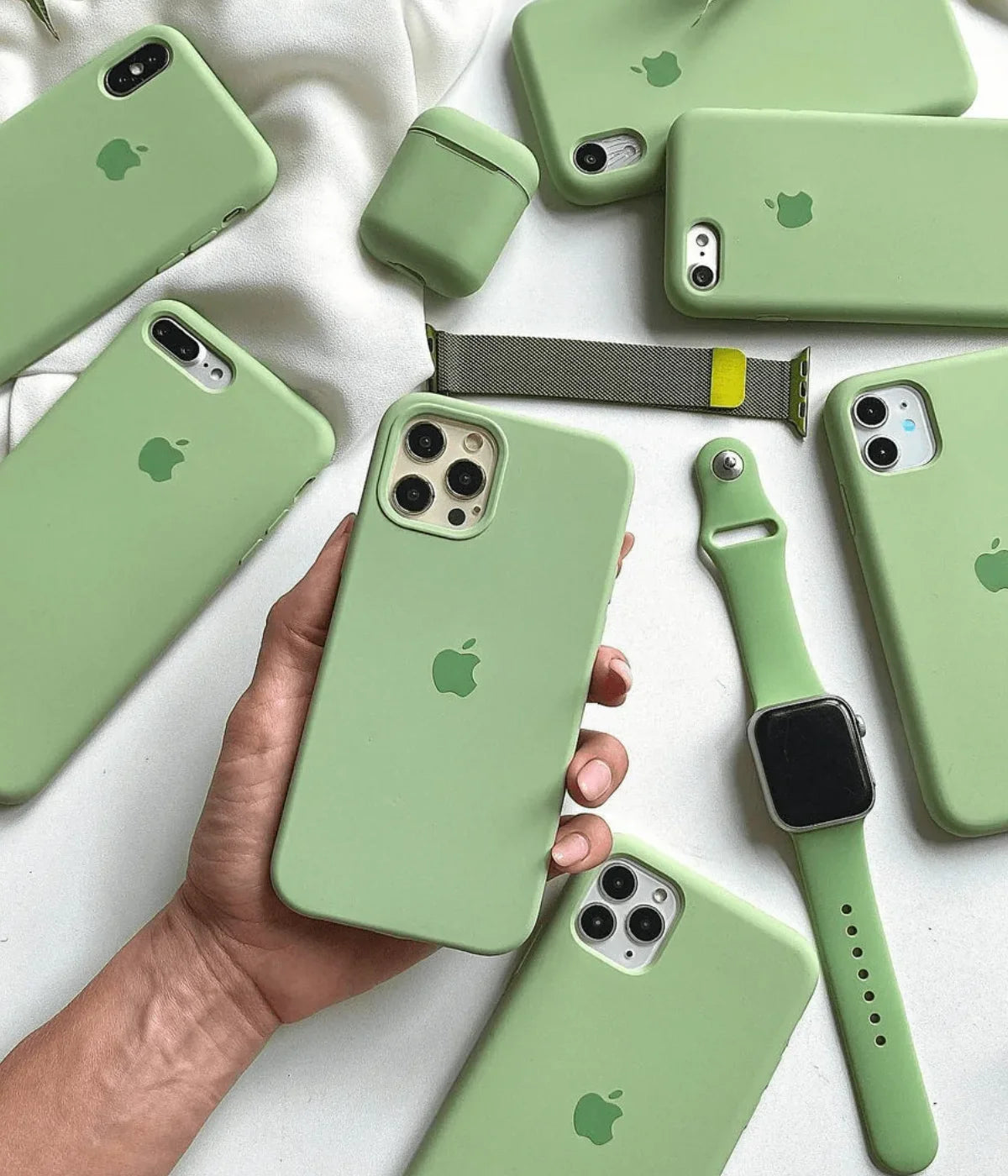 A pistachio green liquid silicone case for the iPhone.