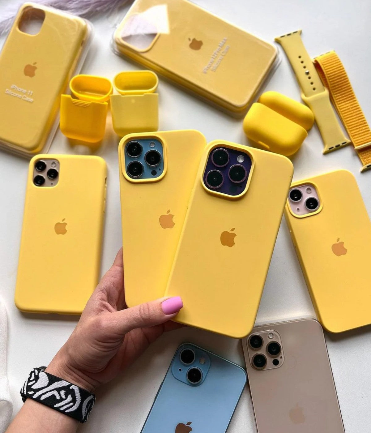 A yellow liquid silicone case for the iPhone.