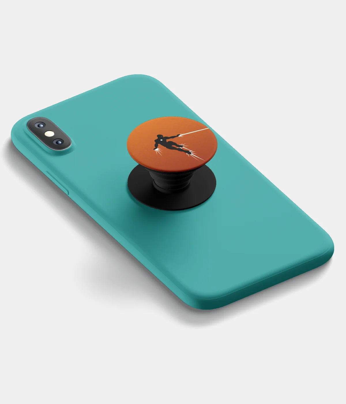 A top-down view of a phone grip holder attached to a mobile phone case on a white background