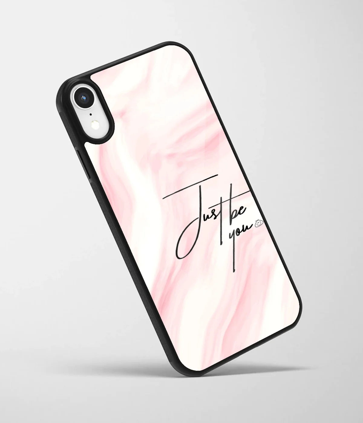 An angled view of a glass phone case featuring a vibrant design.