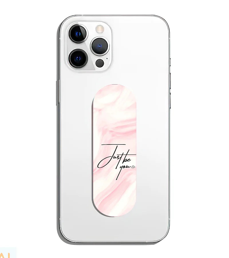 A phone grip slider applied to the back of a smartphone.