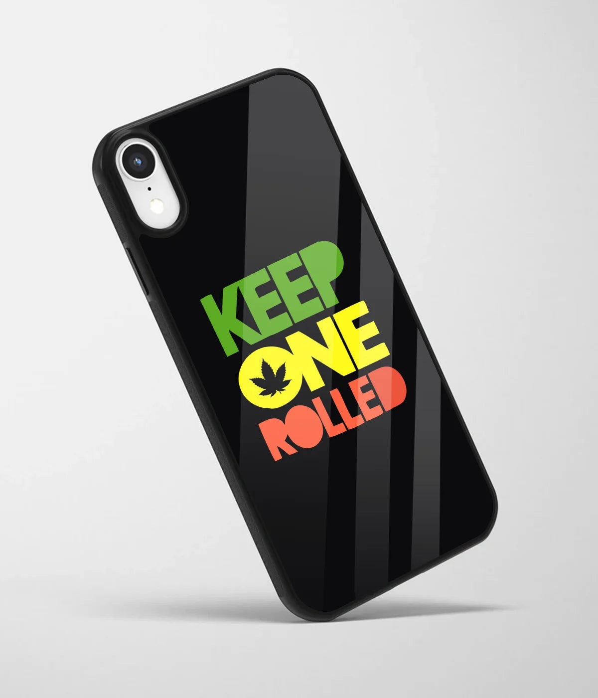 An angled view of a glass phone case featuring a vibrant design.