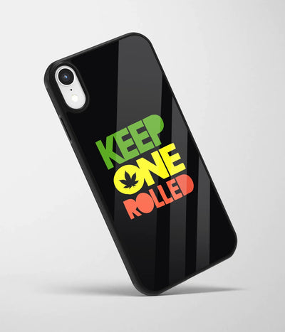 An angled view of a glass phone case featuring a vibrant design.