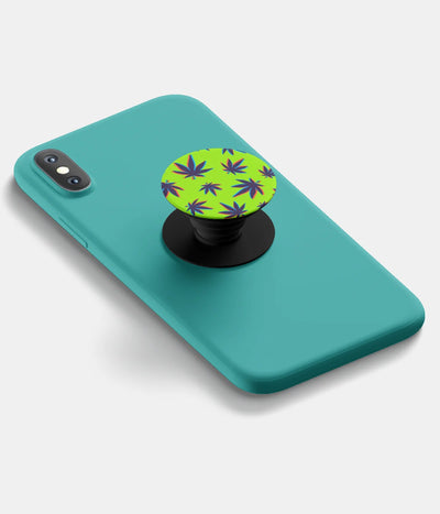 A top-down view of a phone grip holder attached to a mobile phone case on a white background