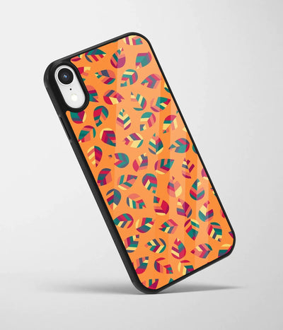 An angled view of a glass phone case featuring a vibrant design.