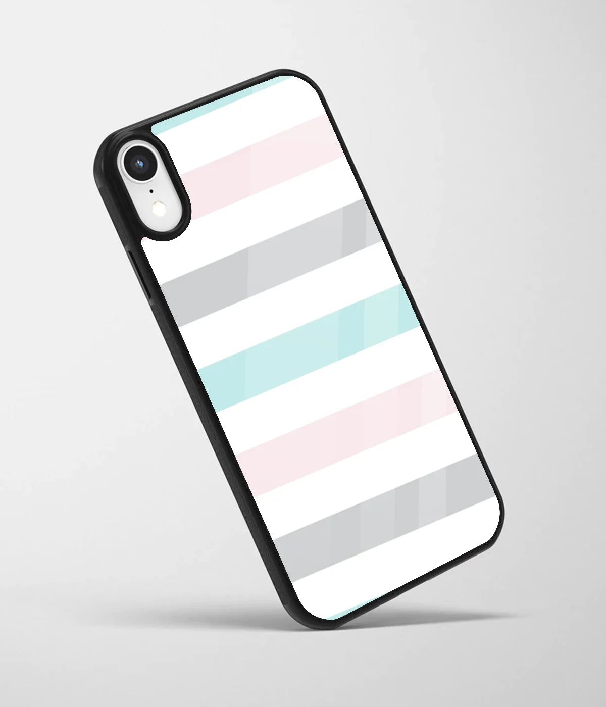 An angled view of a glass phone case featuring a vibrant design.