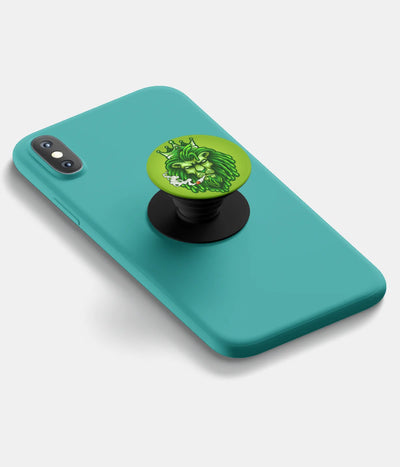 A top-down view of a phone grip holder attached to a mobile phone case on a white background