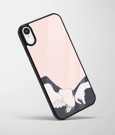 An angled view of a glass phone case featuring a vibrant design.