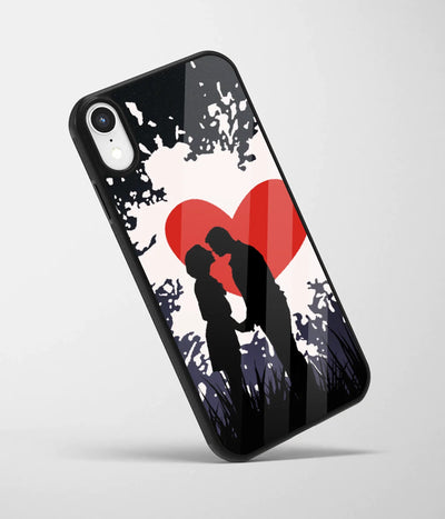 An angled view of a glass phone case featuring a vibrant design.