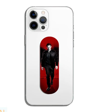 A phone grip slider applied to the back of a smartphone.