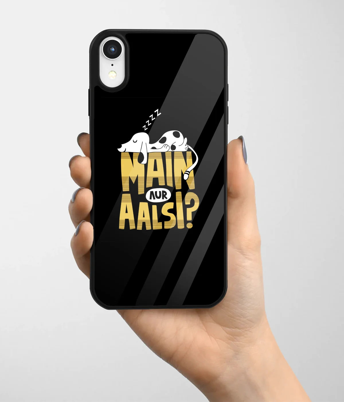 A hand holding a glass phone case with a colorful design.