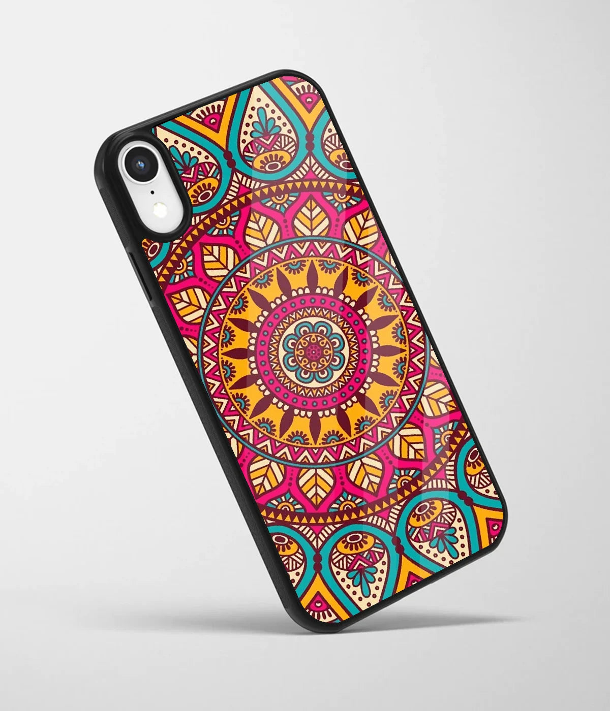 An angled view of a glass phone case featuring a vibrant design.