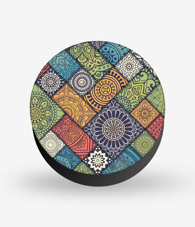 Mobile phone grip with a colorful design on a white background