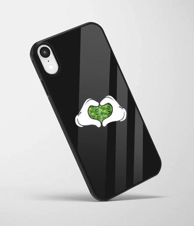 An angled view of a glass phone case featuring a vibrant design.