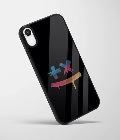An angled view of a glass phone case featuring a vibrant design.