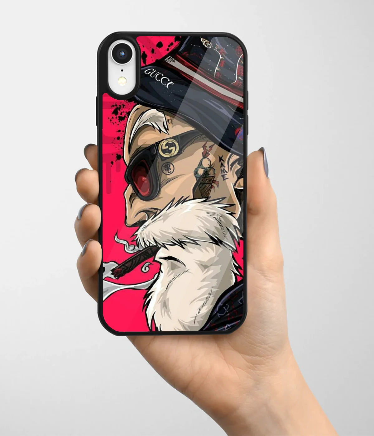 A hand holding a glass phone case with a colorful design.