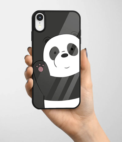 A hand holding a glass phone case with a colorful design.