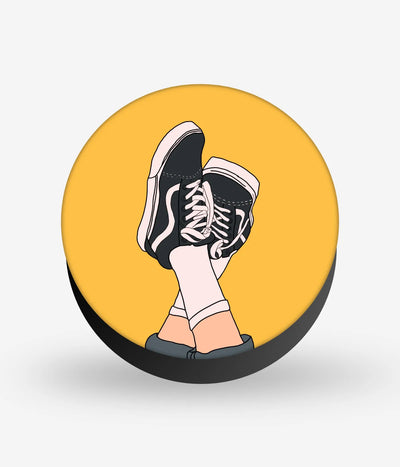 Mobile phone grip with a colorful design on a white background