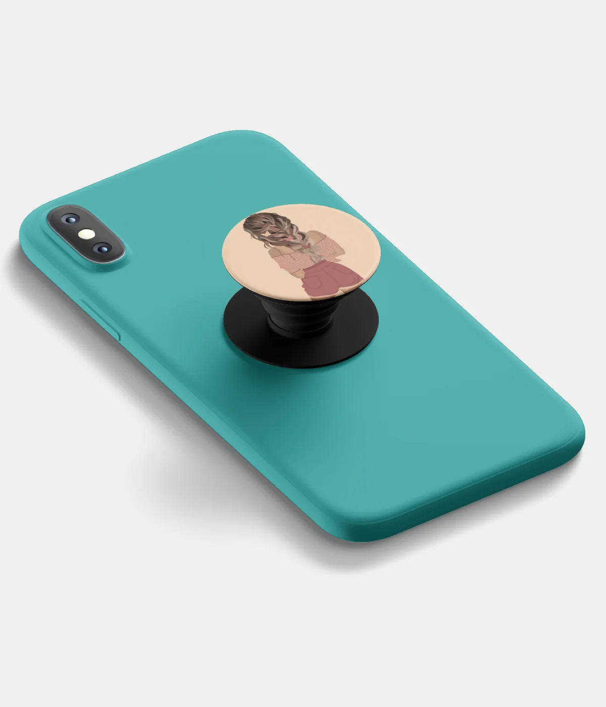 A top-down view of a phone grip holder attached to a mobile phone case on a white background