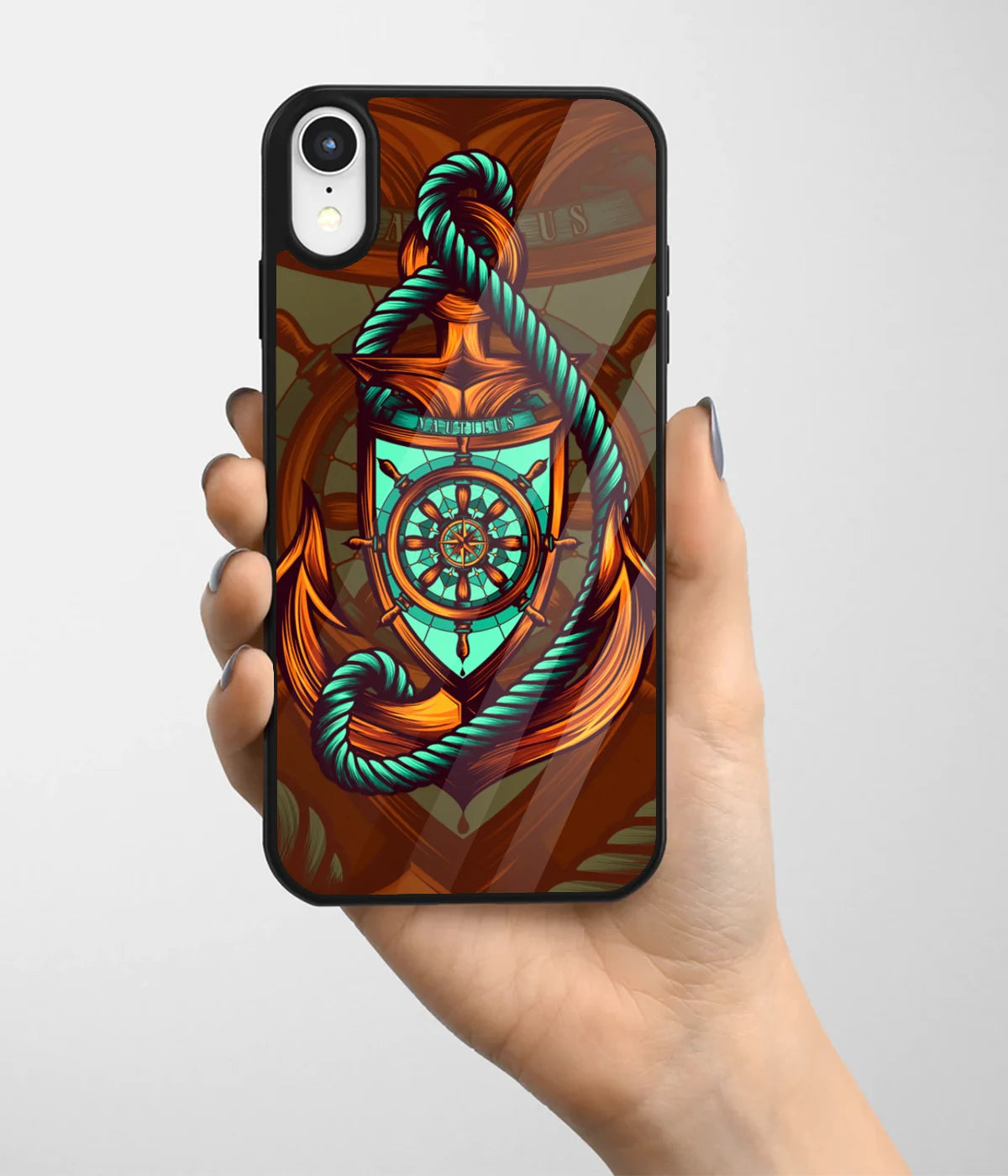 A hand holding a glass phone case with a colorful design.
