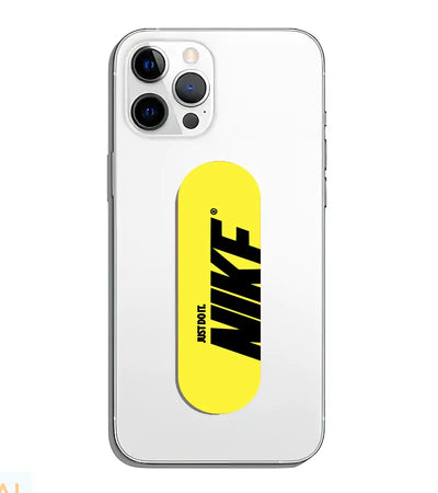 A phone grip slider applied to the back of a smartphone.