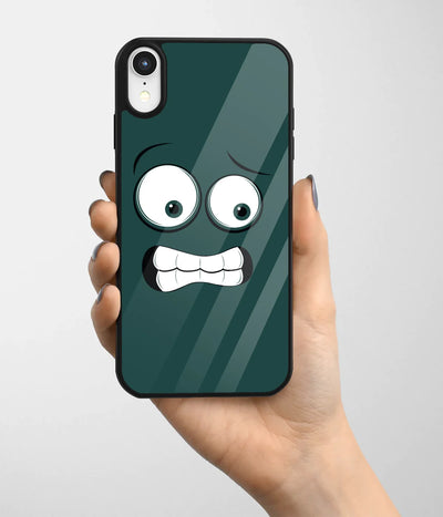 A hand holding a glass phone case with a colorful design.