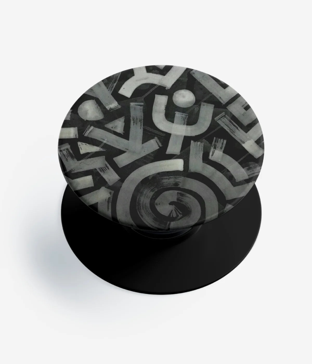 A top-down view of a phone grip holder on a clean white background