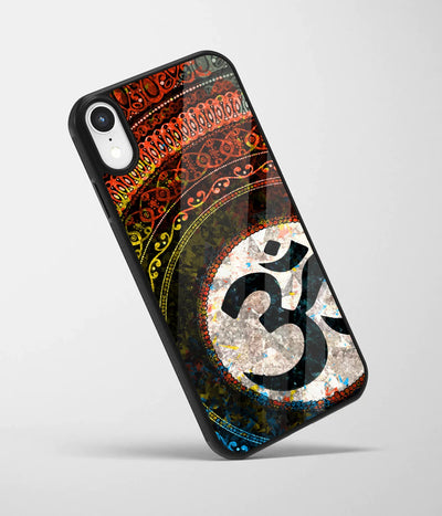 An angled view of a glass phone case featuring a vibrant design.