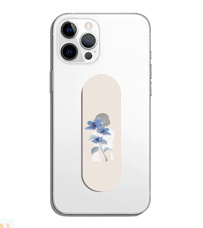 A phone grip slider applied to the back of a smartphone.