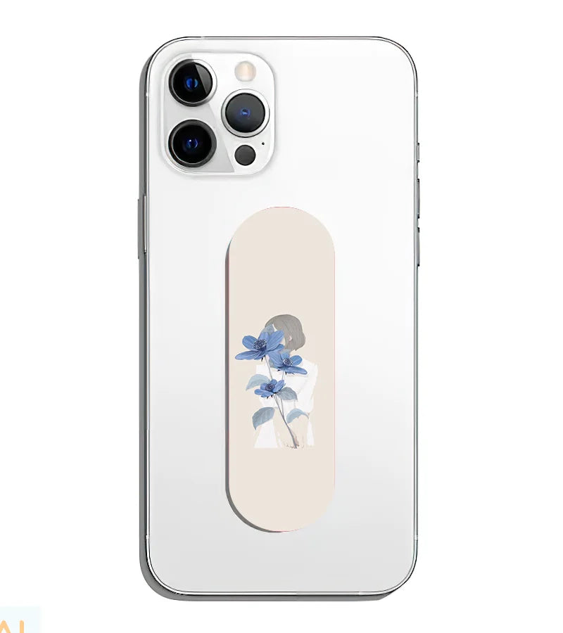 A phone grip slider applied to the back of a smartphone.