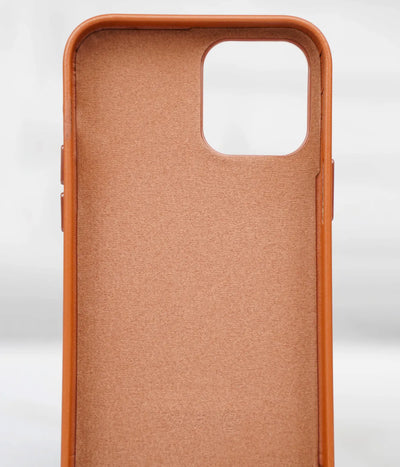 Inside view of the brown premium leather iPhone case showing the soft interior lining designed to protect the back of the phone from scratches.