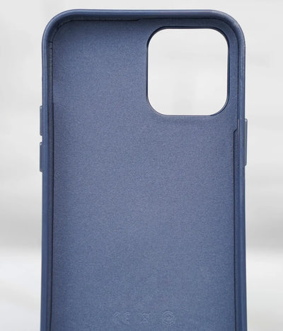 Inside view of the Deep Navy premium leather iPhone case showing the soft interior lining designed to protect the back of the phone from scratches.