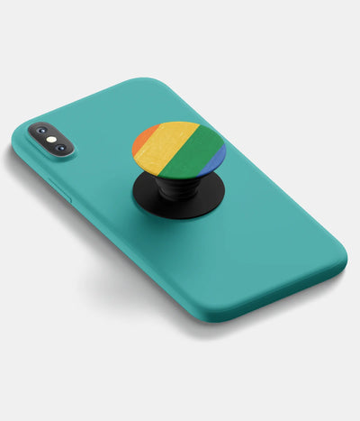 A top-down view of a phone grip holder attached to a mobile phone case on a white background