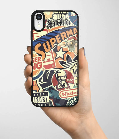 A hand holding a glass phone case with a colorful design.